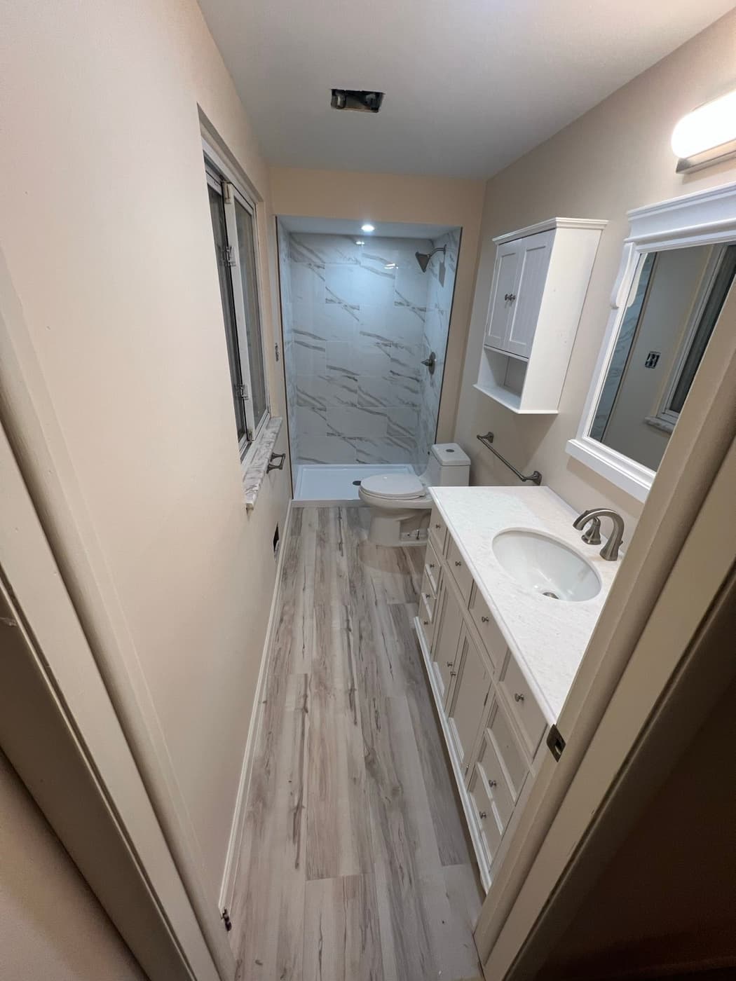Remodeled bathroom with custom tile shower — bathroom remodeling in Dearborn, MI